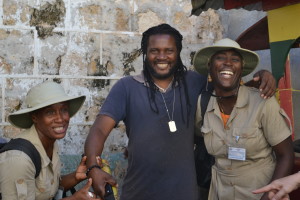 Our culinary tour guides with one of the food vendors.